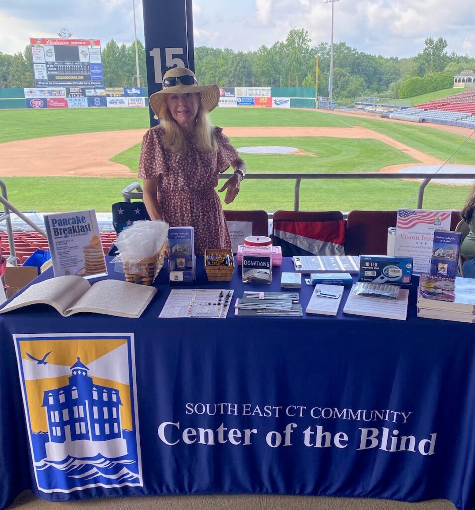 Laura covers the Center's booth at the Healthy Living Festival at Dodd Stadium.