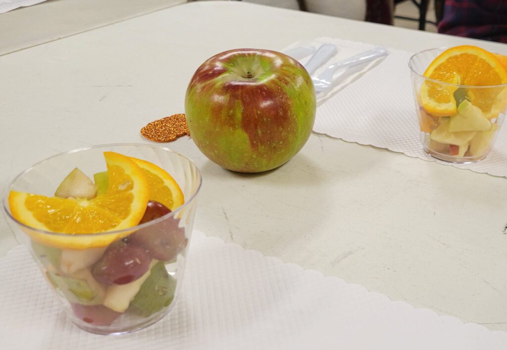 Fresh fruit cup and apple
